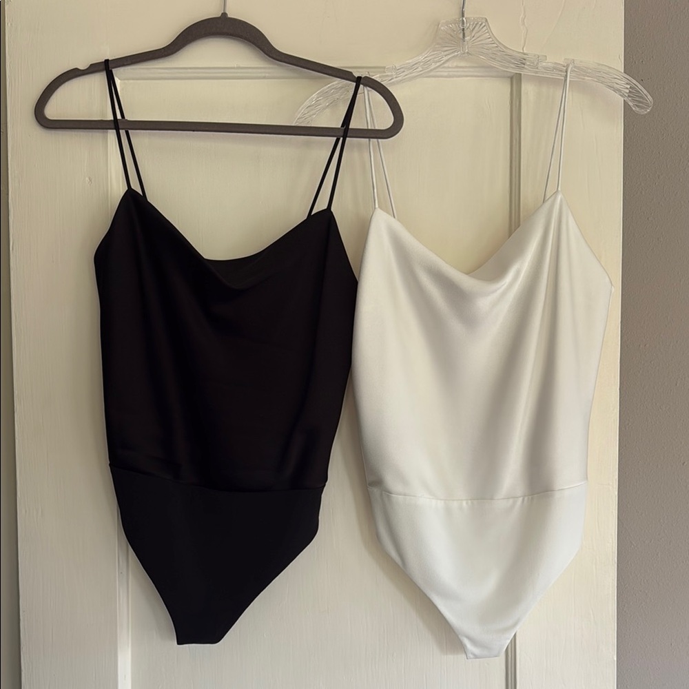 Alice + Olivia Black and White Harmon bodysuits.